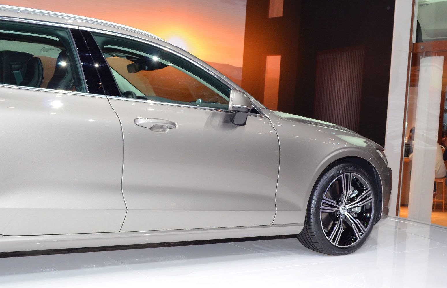 Side profile with sleek door design and alloy wheels