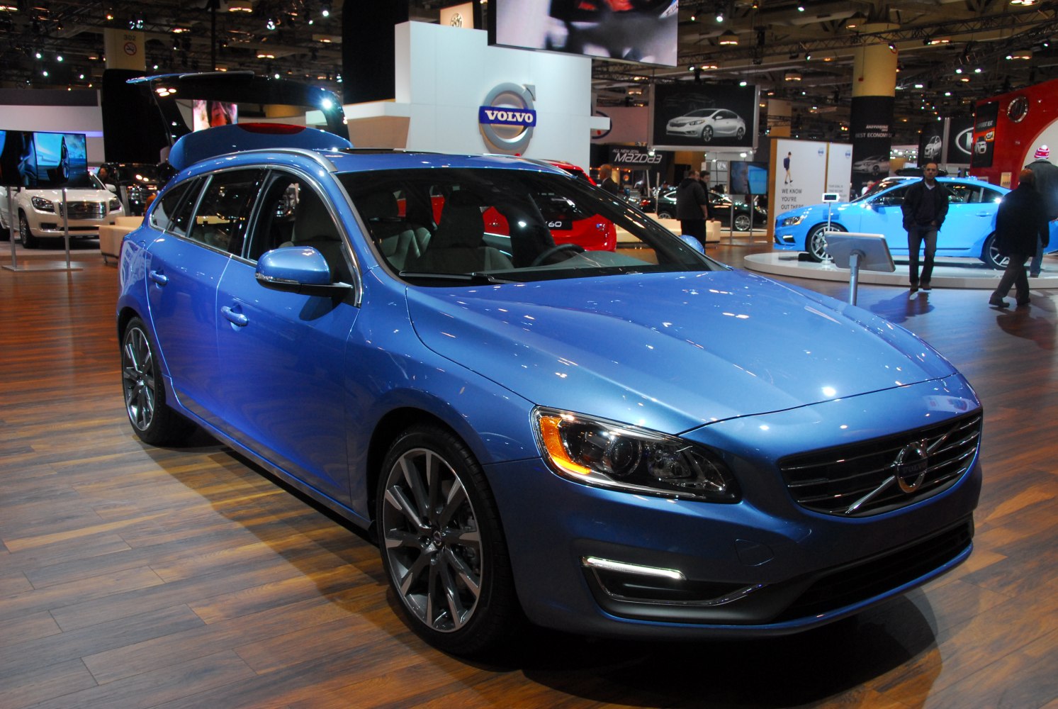 Blue station wagon with LED headlights and alloy wheels