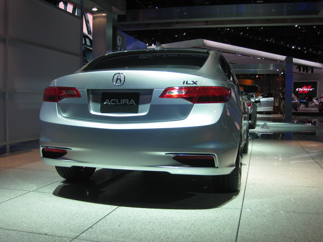 Rear view with sleek tail lights and trunk detail