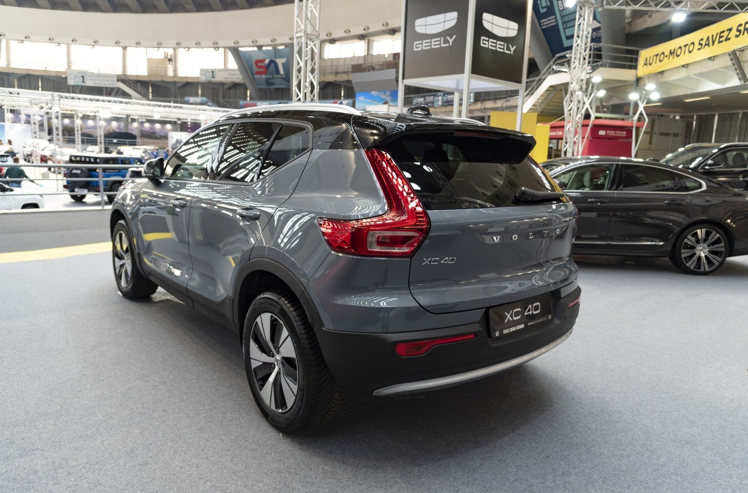 Rear view featuring LED taillights and rear spoiler on a modern compact SUV