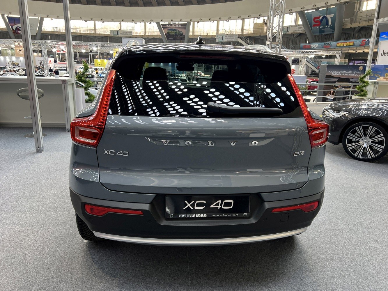 Rear view of modern SUV with distinctive taillights and rear window wiper