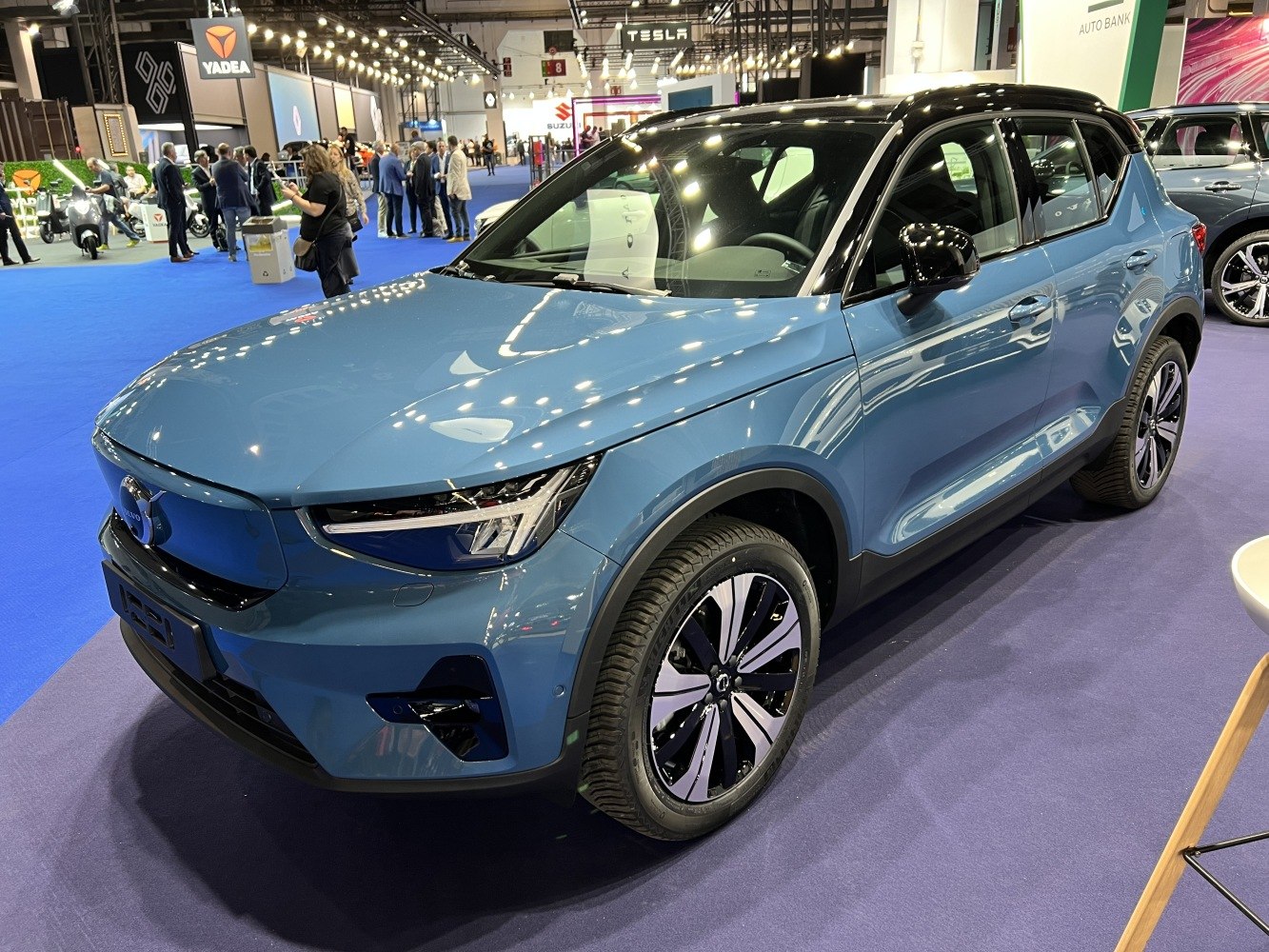 Front side view of blue SUV with LED headlights and alloy wheels