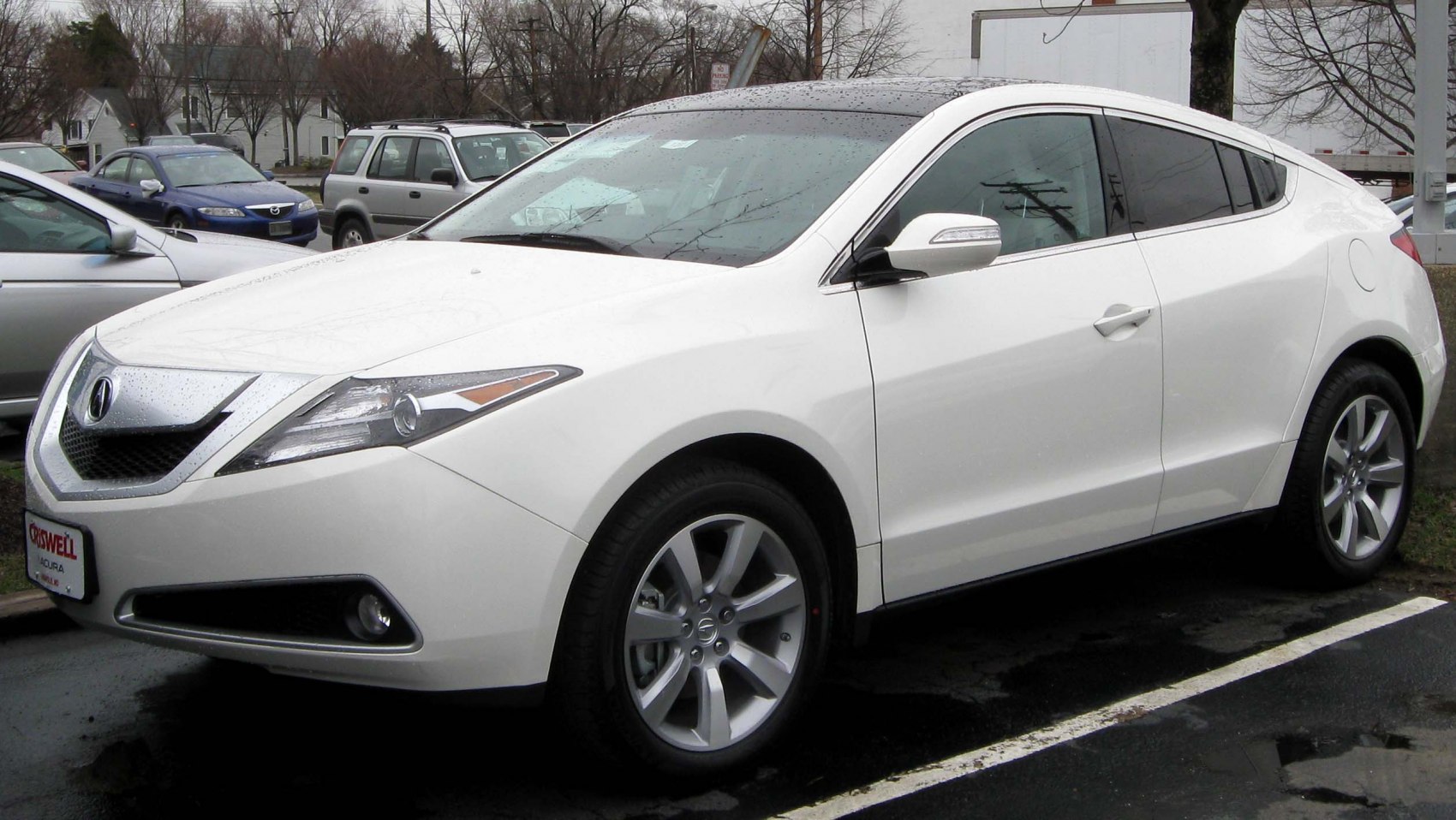 Front side profile with LED headlights and alloy wheel design