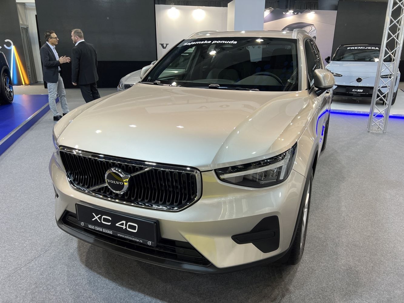 Front view of modern vehicle with grille and LED headlights