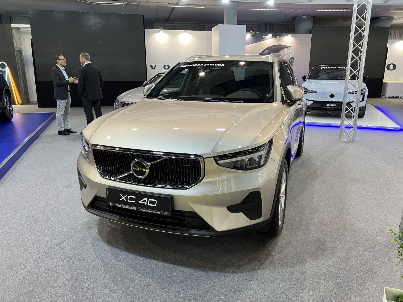 Front view of a modern SUV with sleek headlights and a prominent grille.
