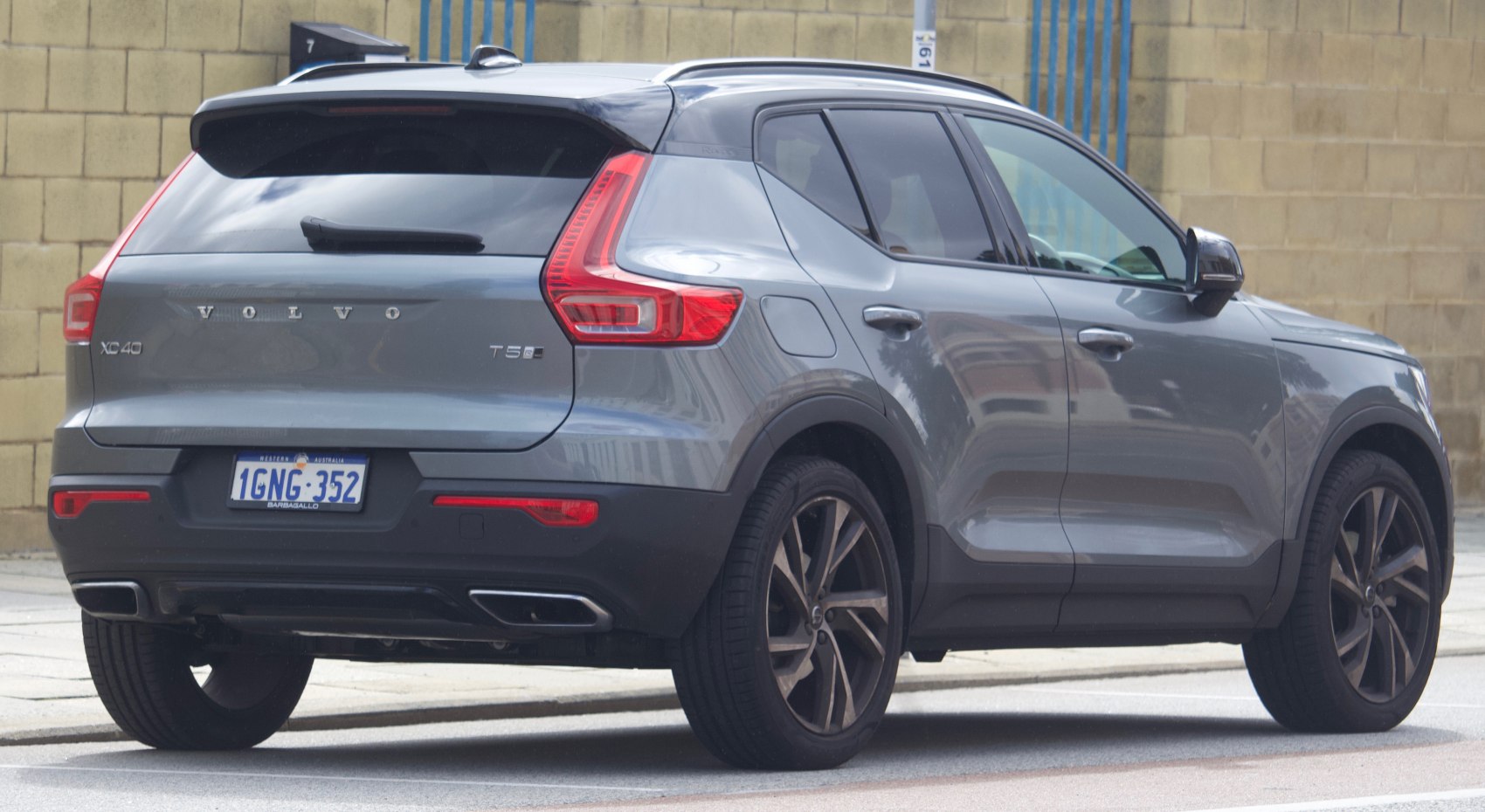 Rear design with LED taillights, dual exhaust, and T5 AWD badge