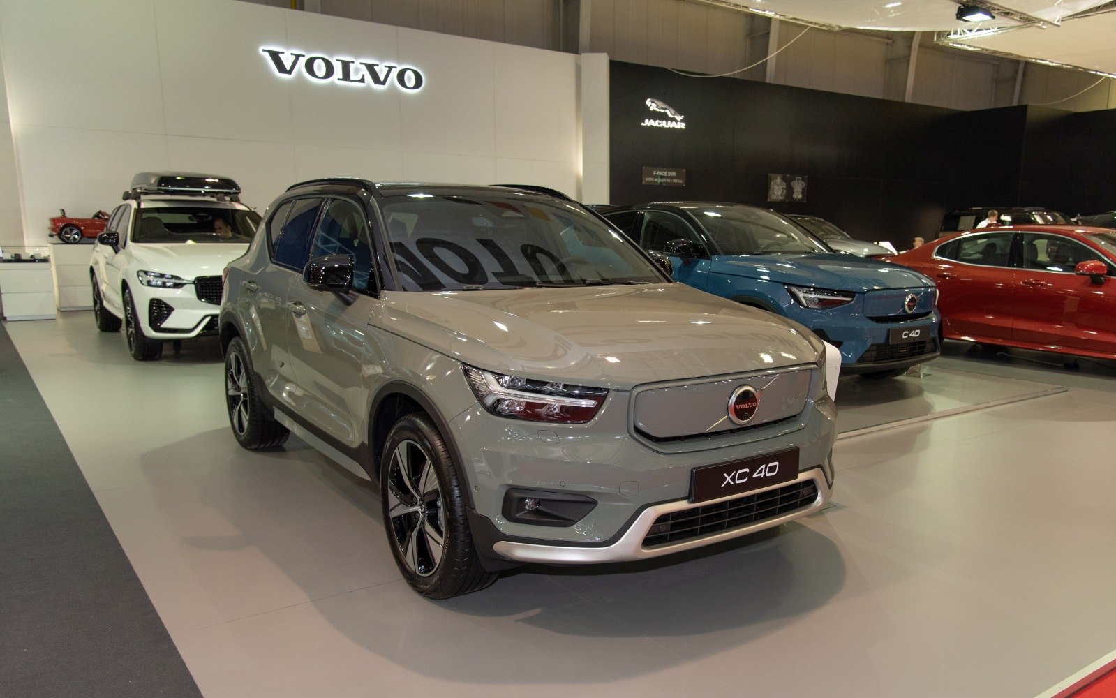 Front view of electric SUV with sleek LED headlights and modern design