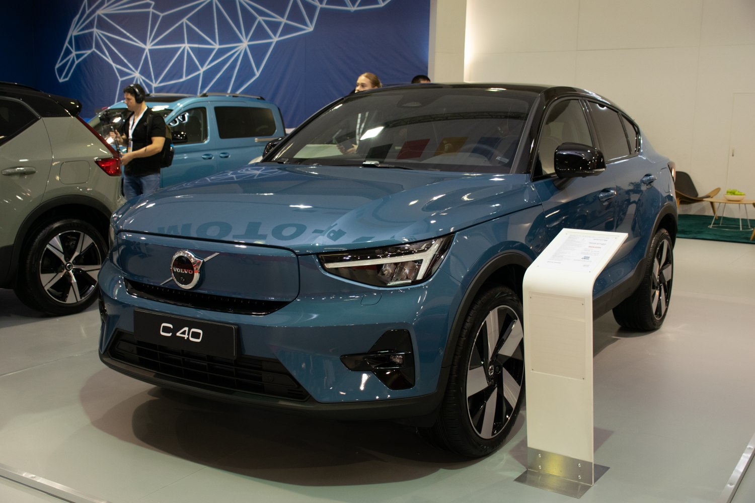 Electric SUV front view with modern LED headlights and large alloy wheels