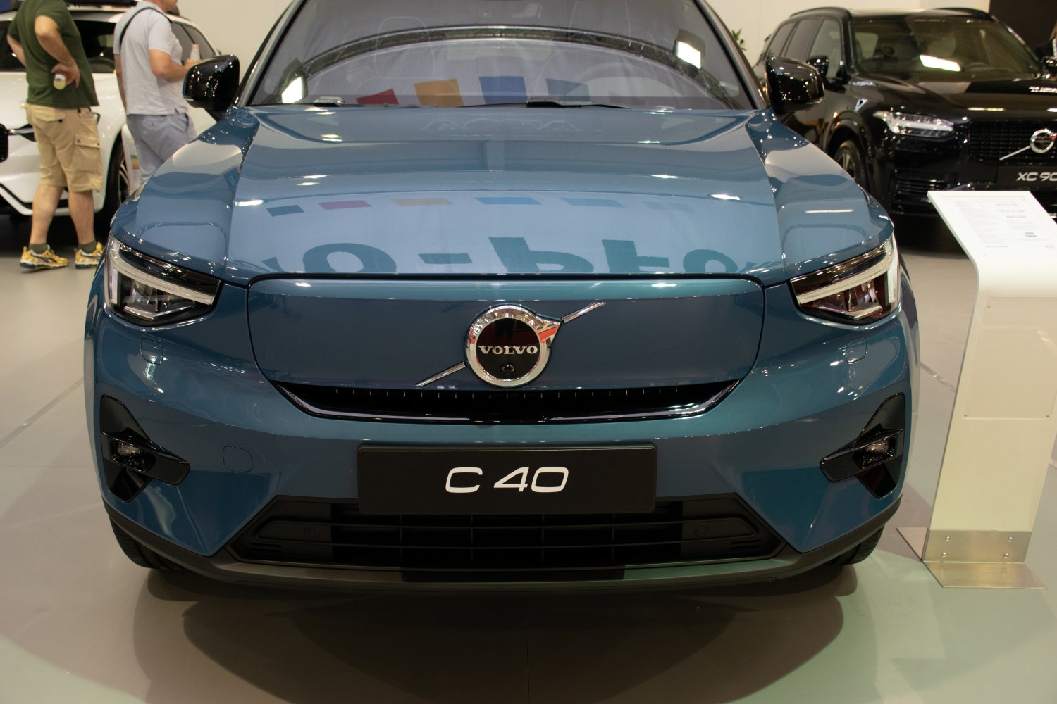 Front exterior view with LED headlights and signature grille of an electric SUV.