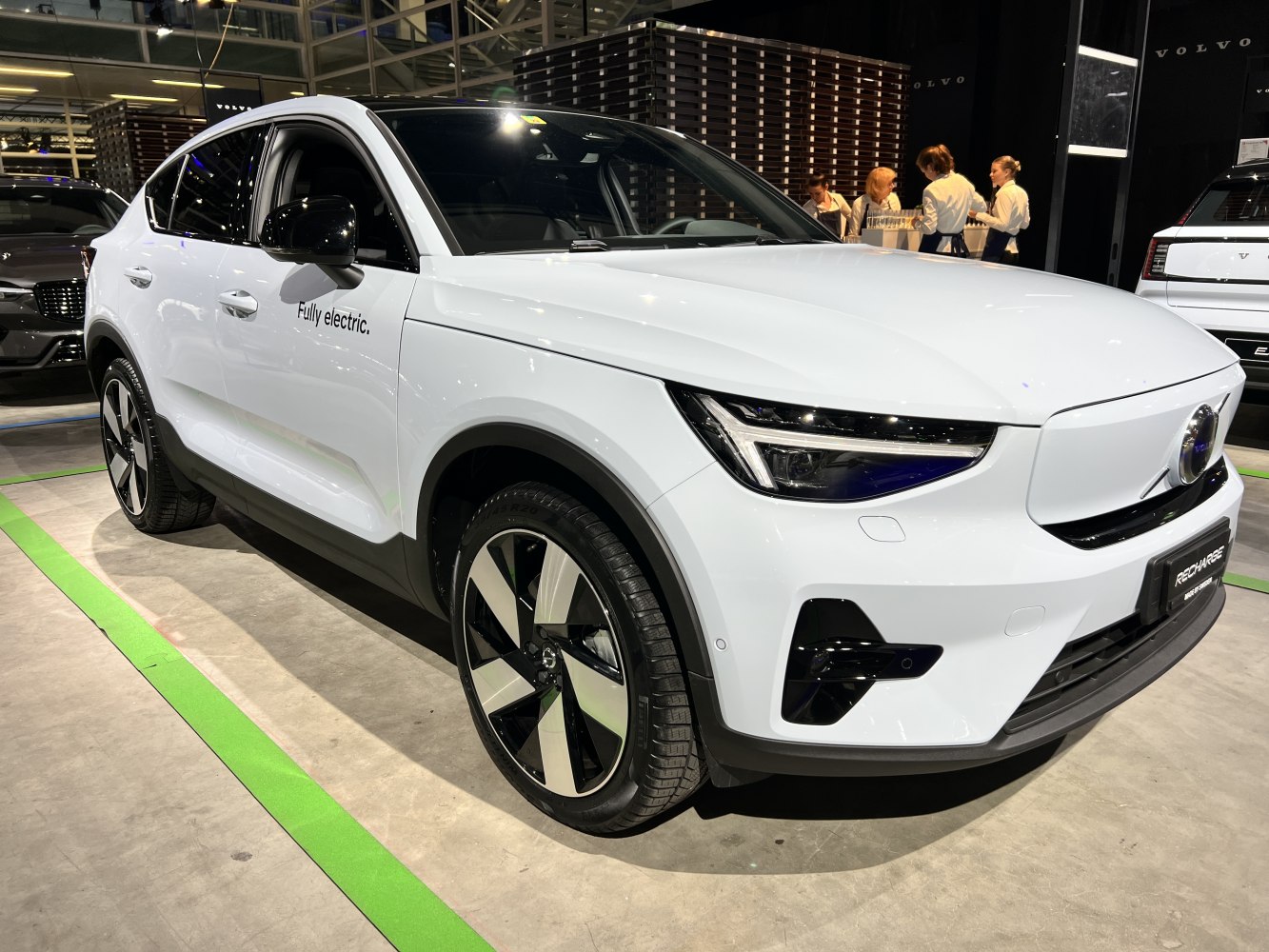 Sleek electric SUV front side with LED headlights and modern wheels