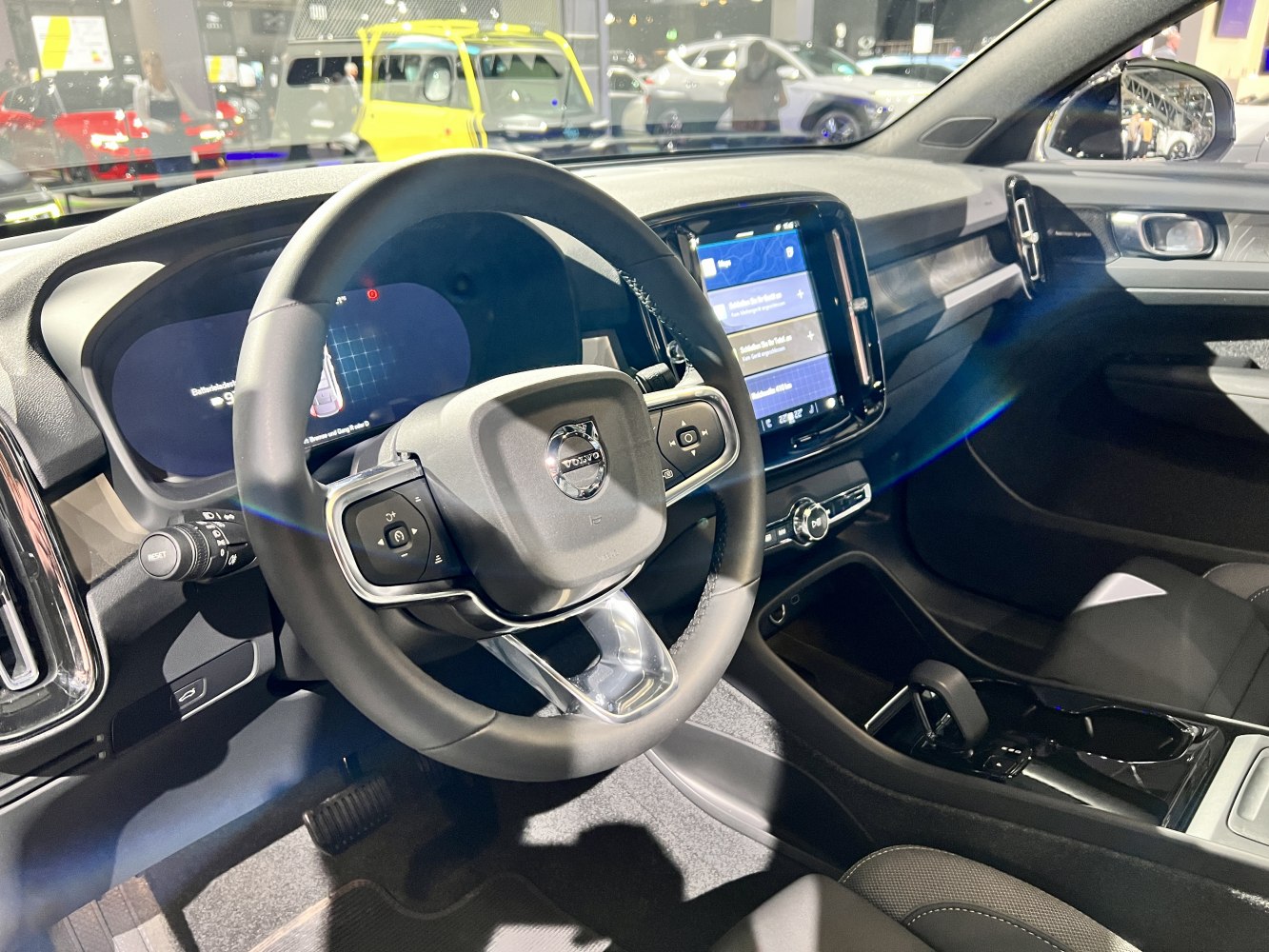 Digital dashboard and touchscreen infotainment with modern steering wheel