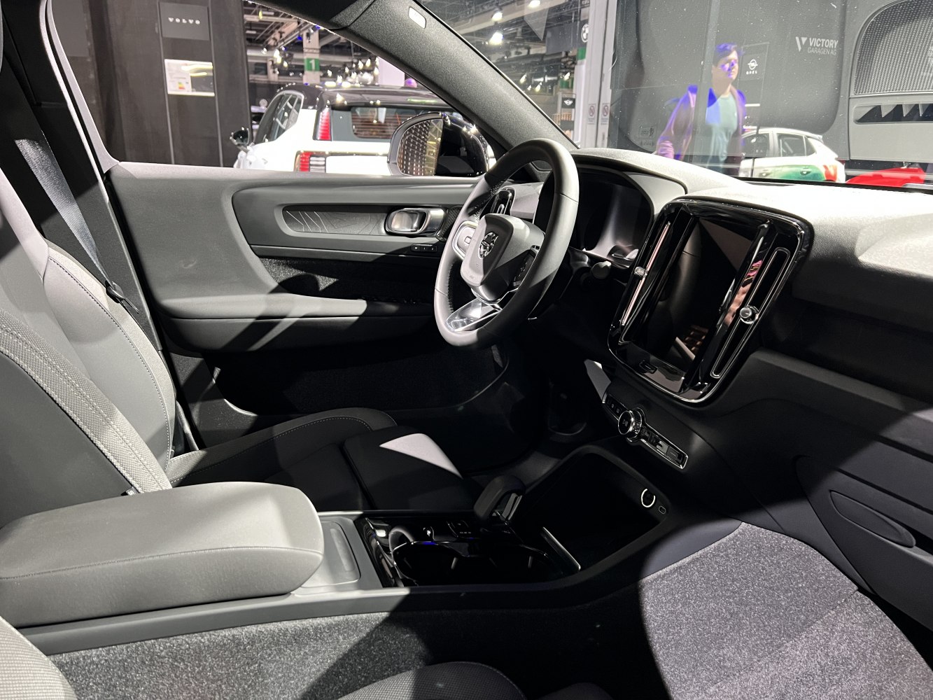 Interior view focused on dashboard, steering wheel, center console