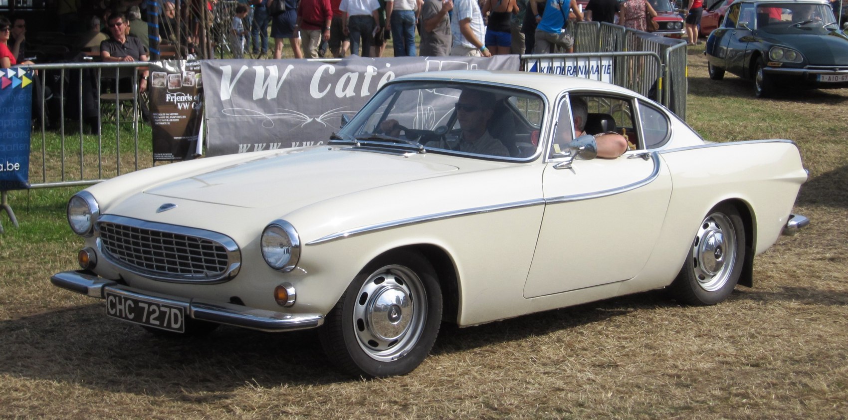 Classic vintage coupe with chrome trim and round headlights