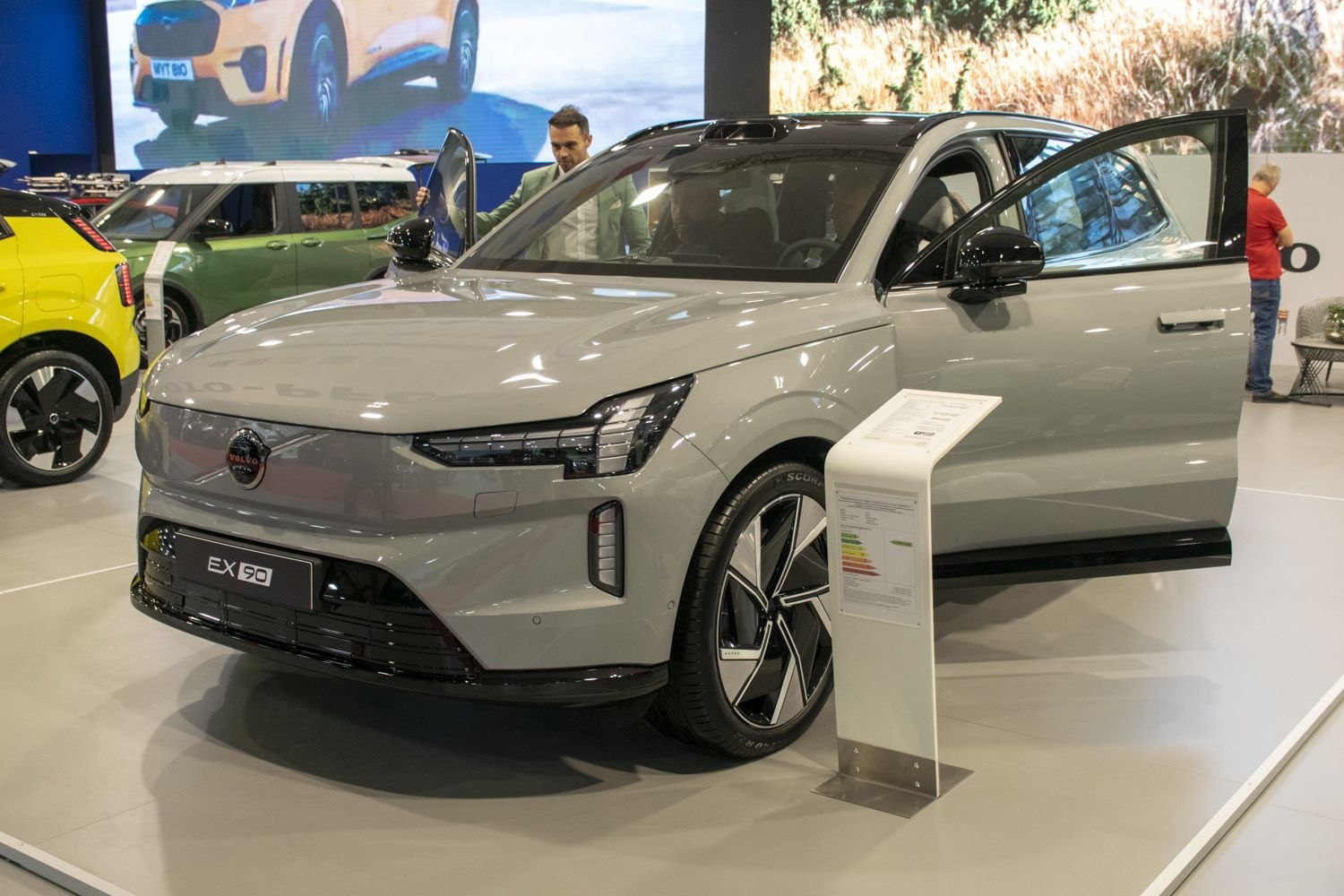 Front three-quarter view of electric SUV with LED headlights and futuristic wheels