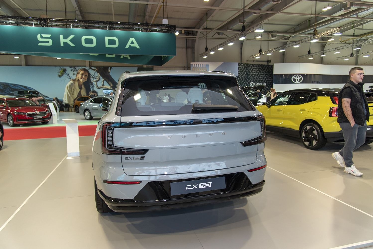 Rear view of modern electric SUV with sleek taillights and large rear window