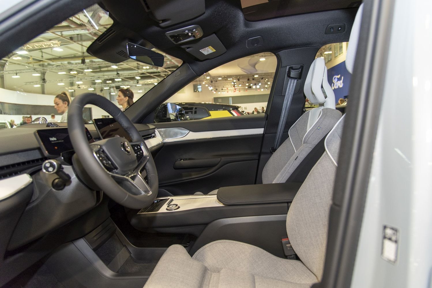 Modern car interior with digital dashboard and premium seats