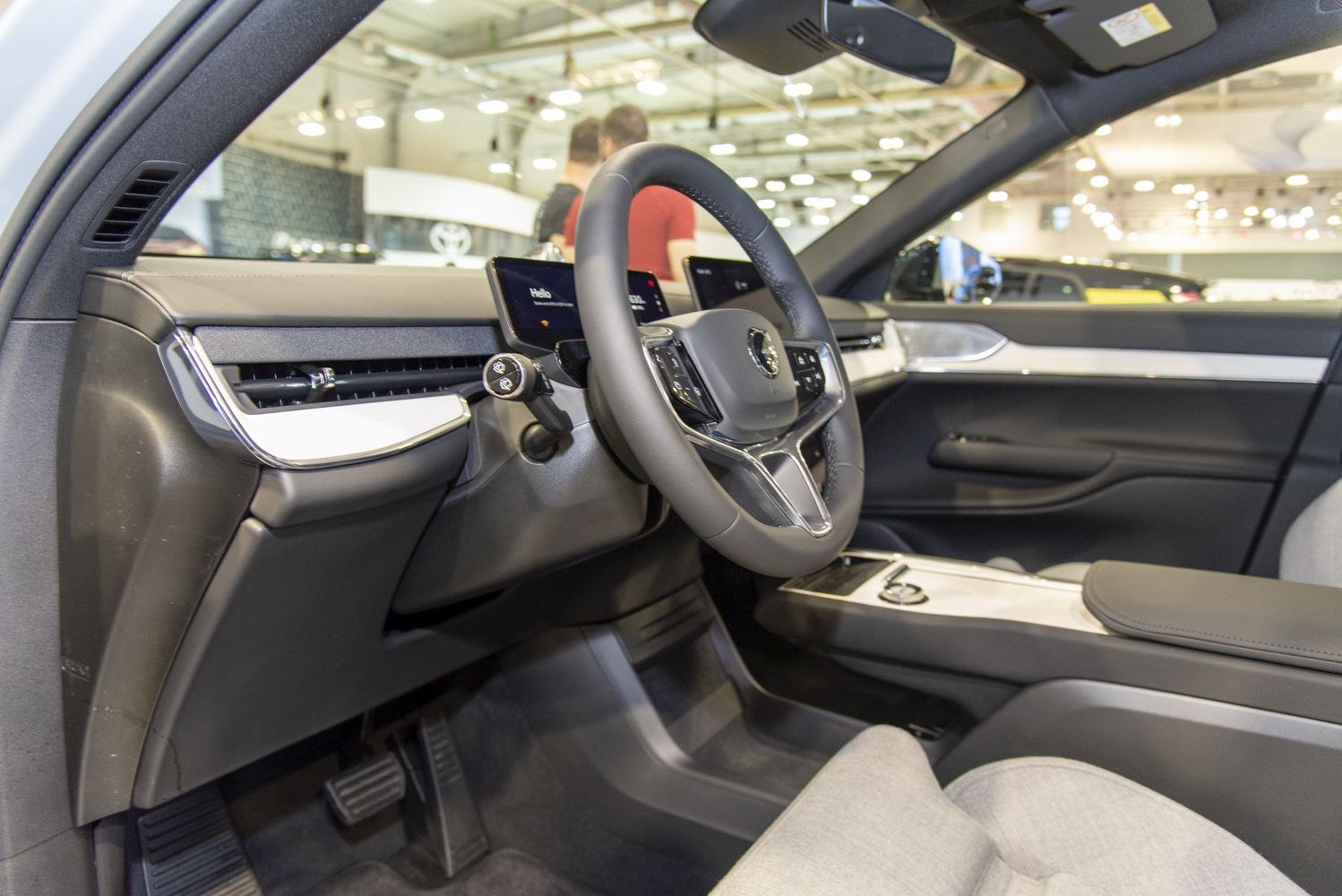 Steering wheel and digital dashboard in modern SUV interior