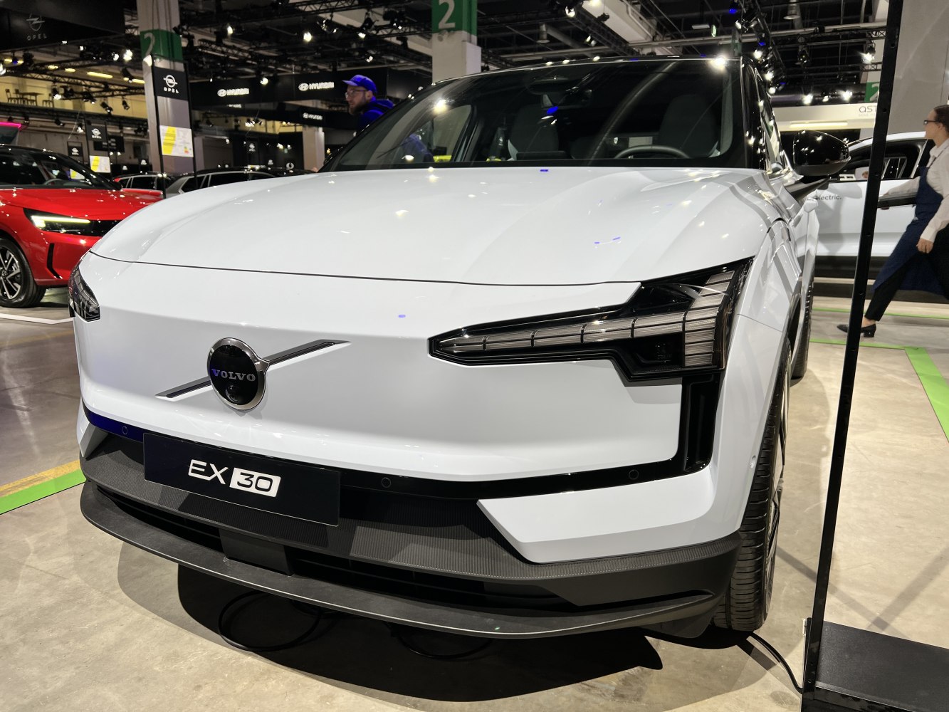 Front view with modern LED headlights and distinctive grille