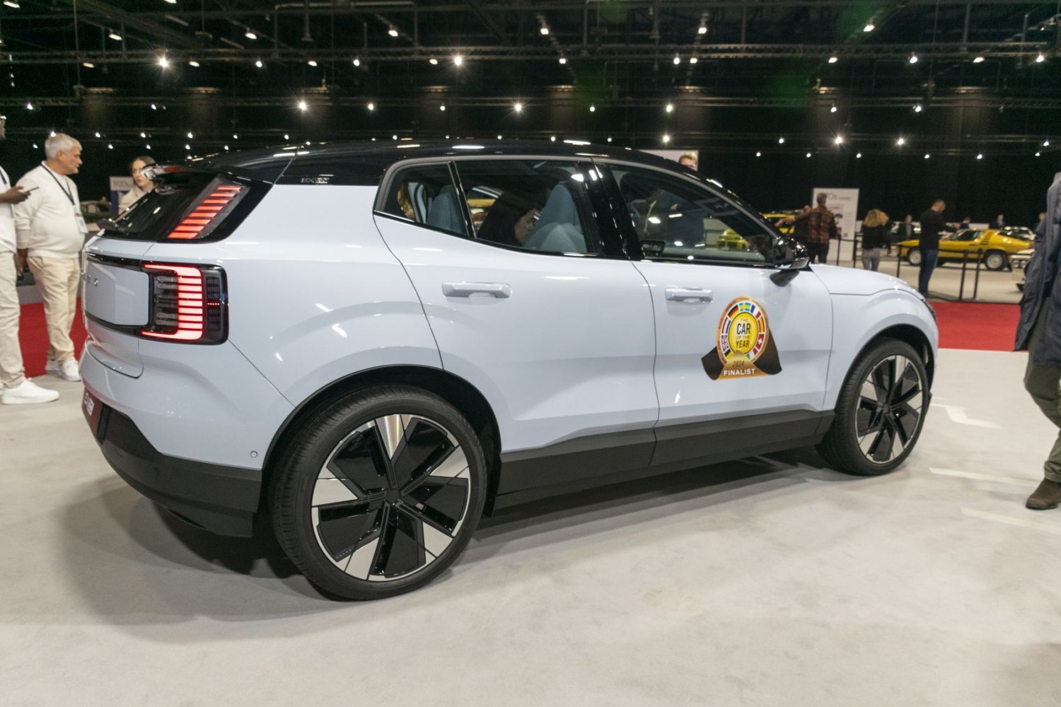 Rear side view with unique vertical LED taillights and modern alloy wheels