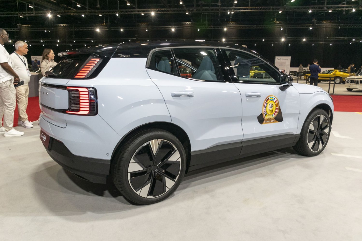 Rear side view of compact SUV with LED tail lights and modern wheels