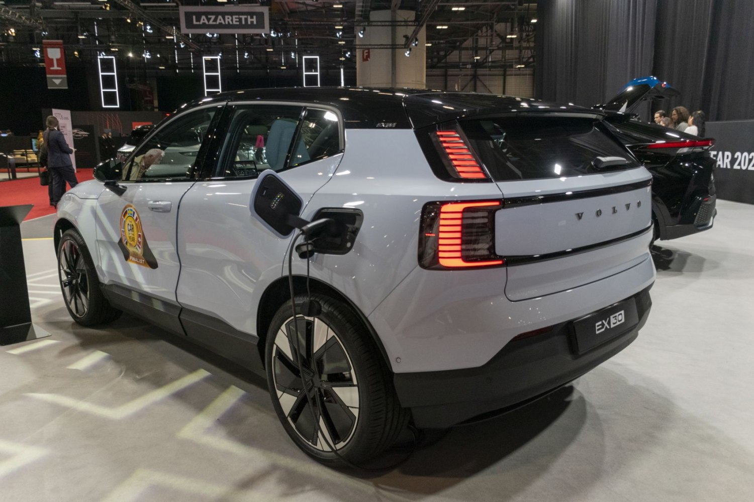 Electric SUV rear charging with distinctive modern tail lights