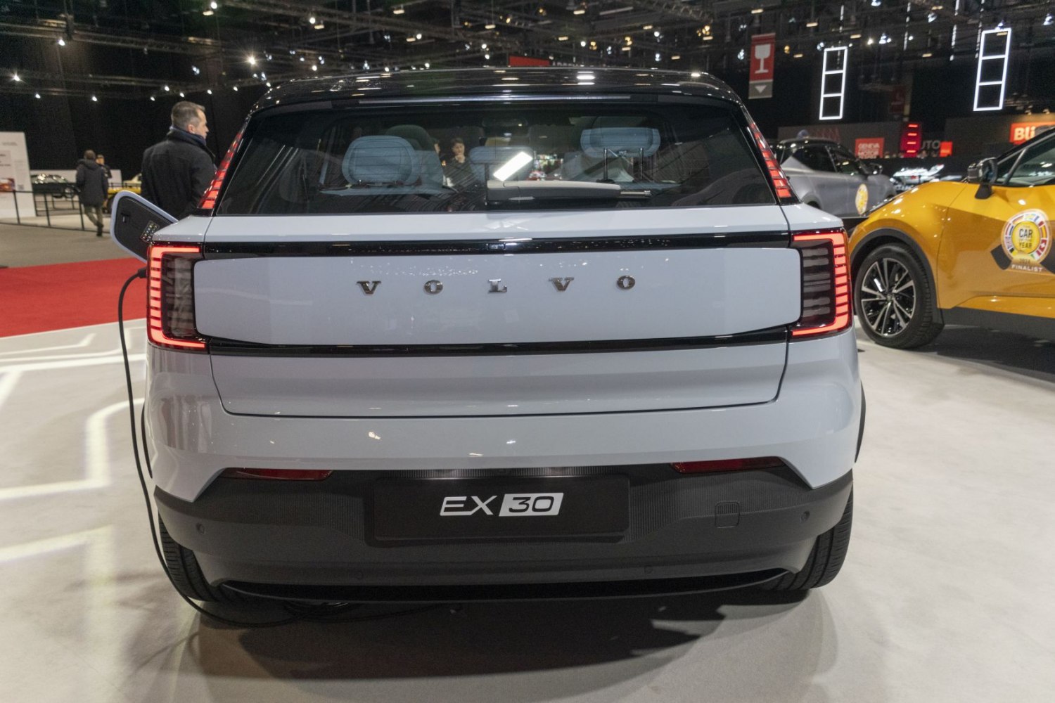 Rear view and charging port of a modern electric vehicle with distinctive taillights
