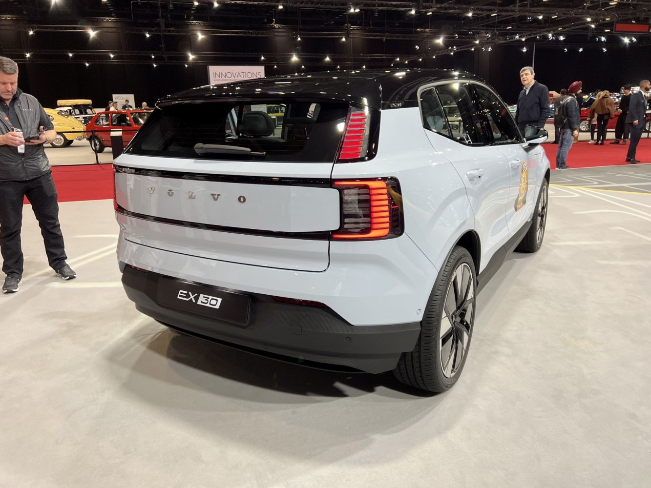 Rear view of an electric SUV with unique LED taillights and modern styling