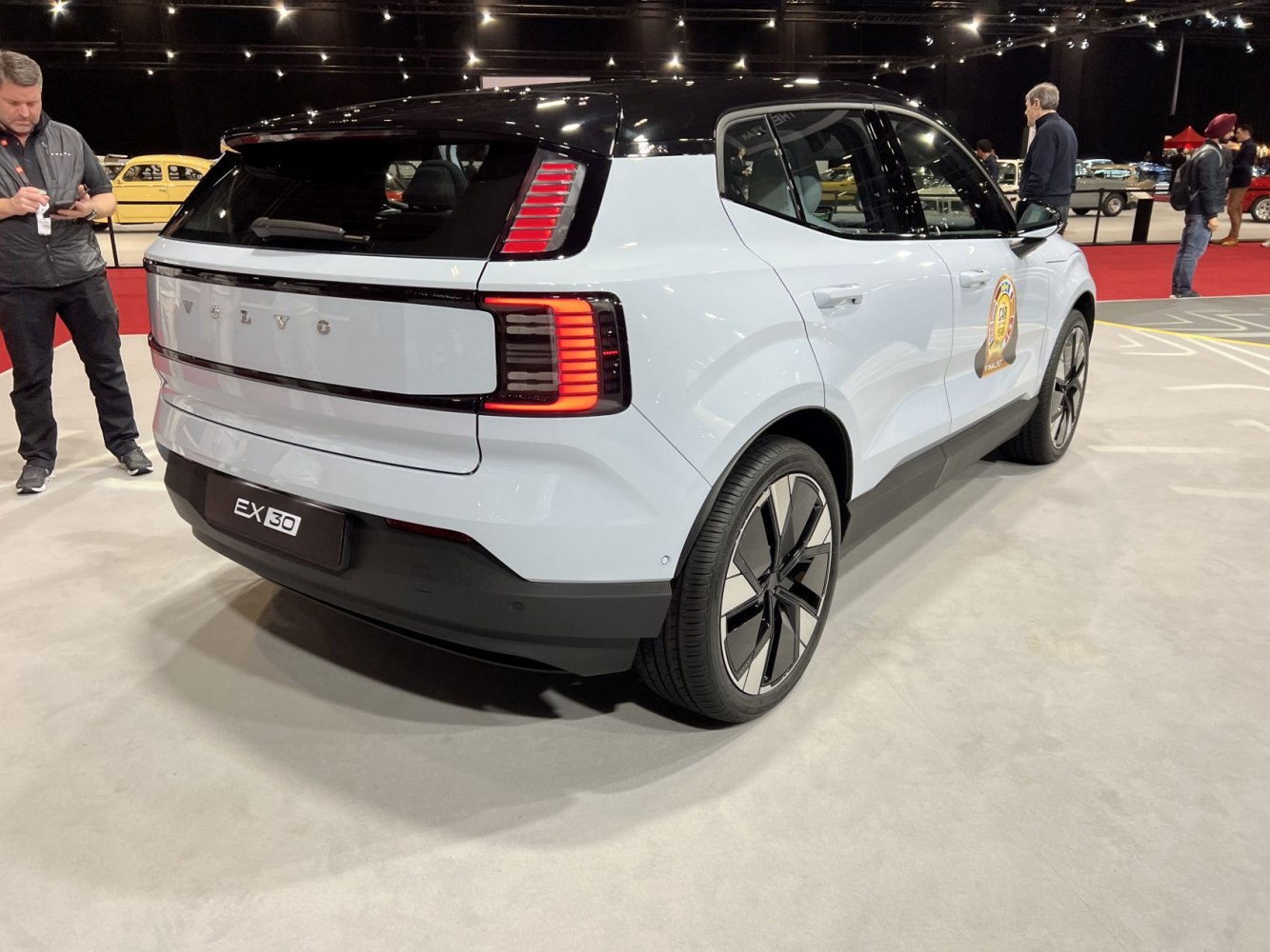 Rear view with distinct taillight design and two-tone roof styling