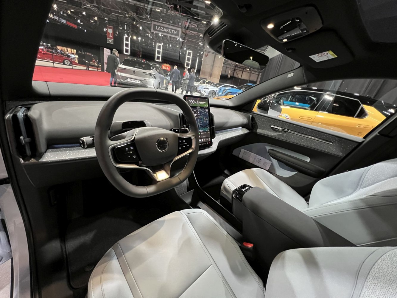 Modern car interior with digital dashboard and multifunction steering wheel
