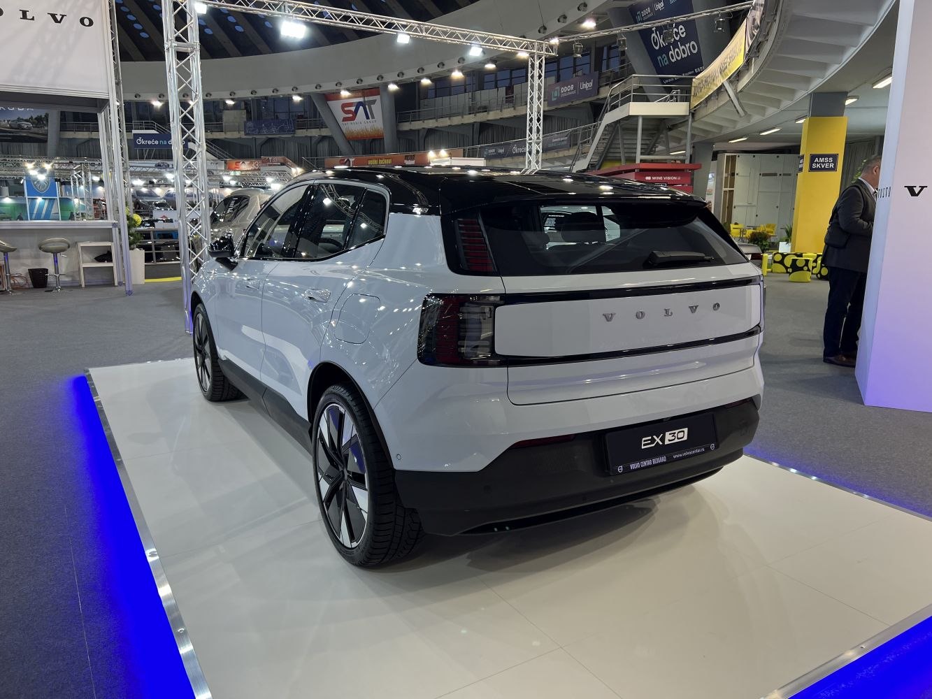 Rear view with distinctive vertical taillights and two-tone roof.