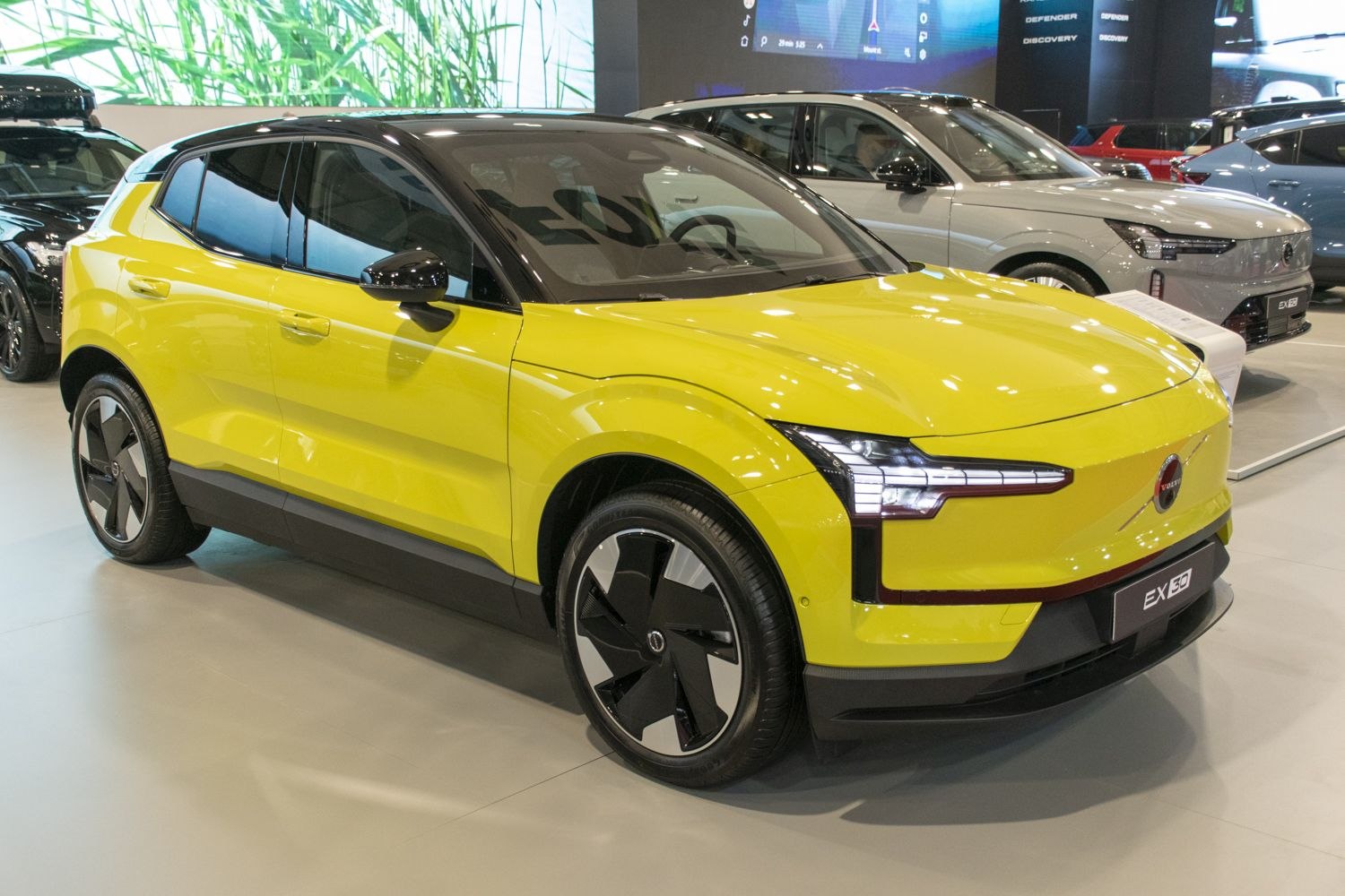 Electric SUV with distinctive LED headlights and two-tone roof
