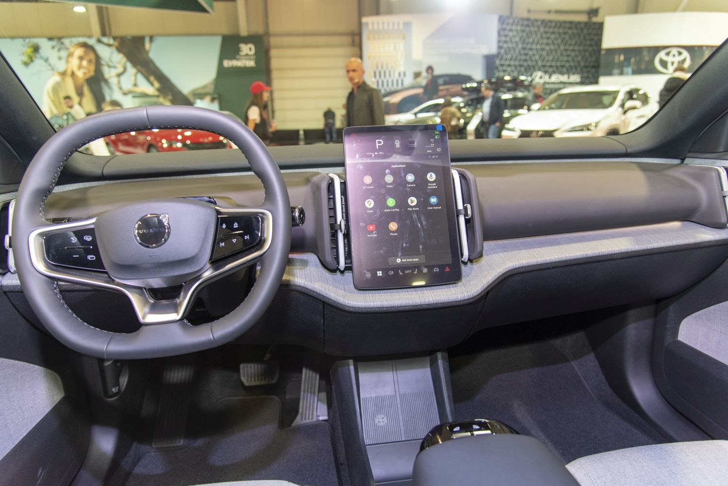 Steering wheel and central touchscreen infotainment display