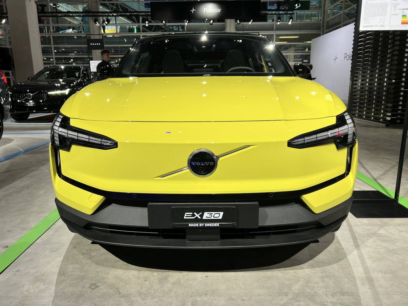Front view of an electric SUV with sleek headlights and bold design