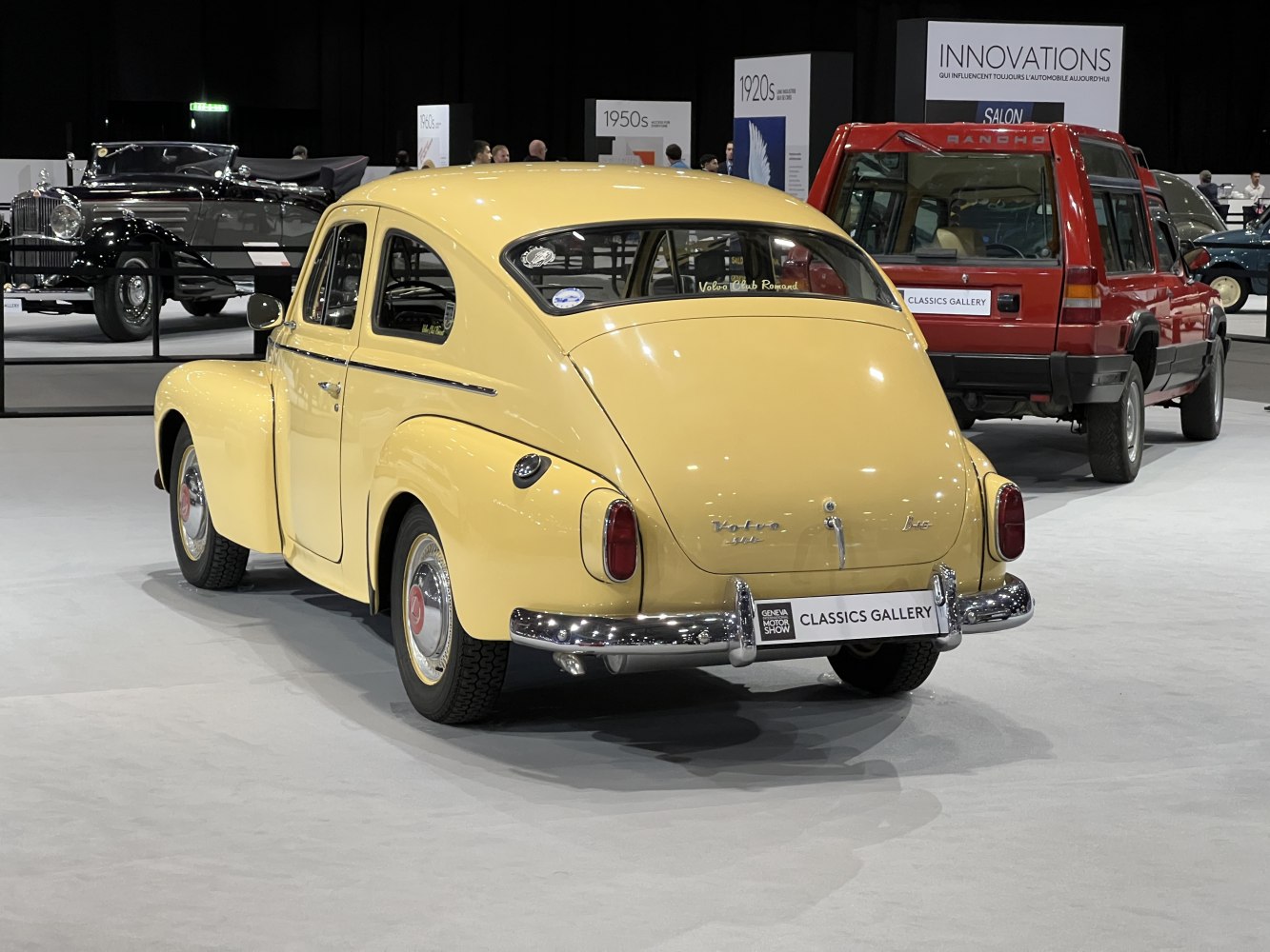 Classic vintage car with rounded rear and chrome bumper