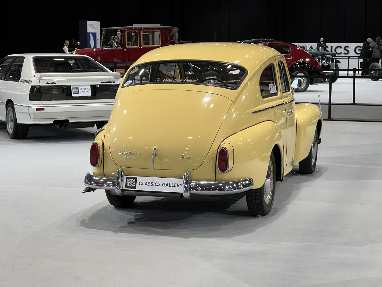 Rear view of classic vintage compact car with rounded tail and curved rear window