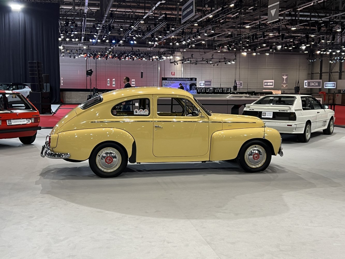 Rounded body and chrome details of classic vintage car side profile