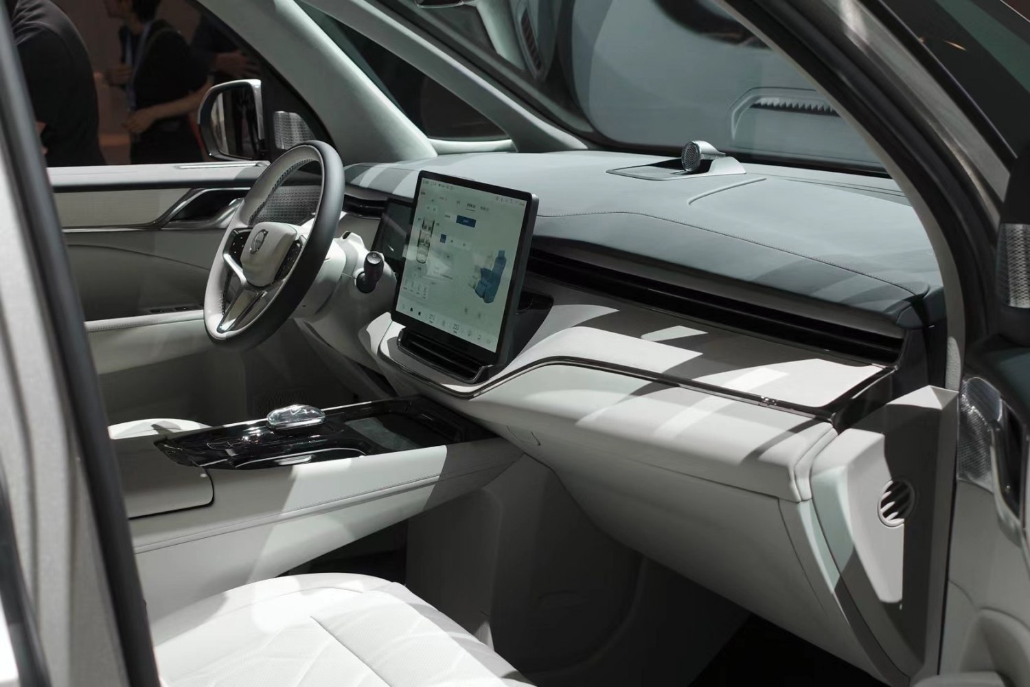 Digital dashboard and modern steering wheel in car interior
