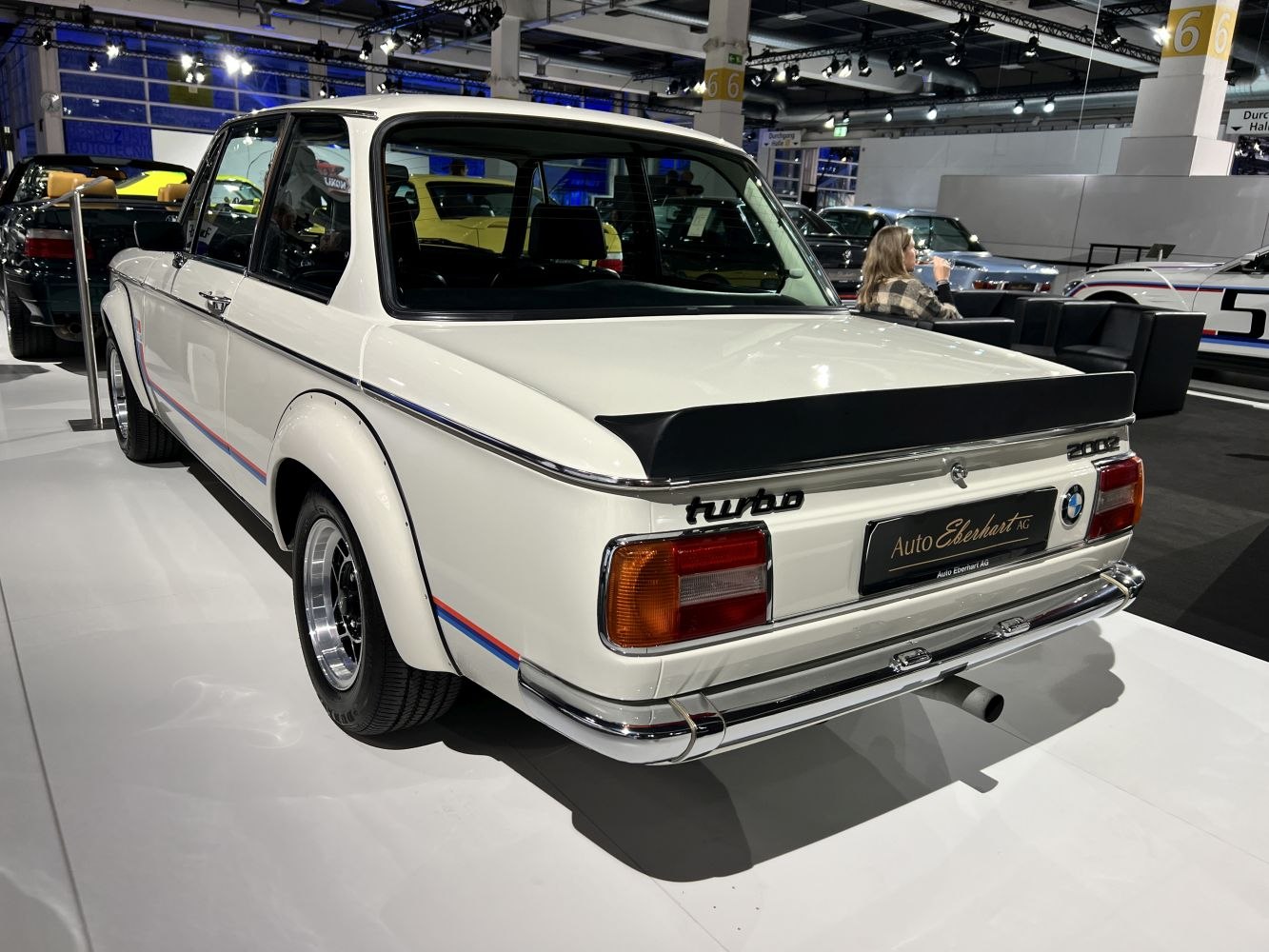 Rear view of classic BMW 02 E10 with turbo badge and rear spoiler