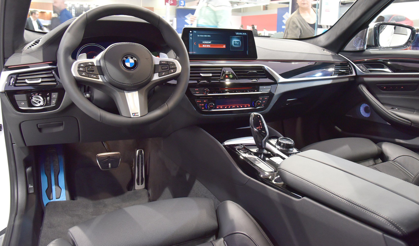 Luxury car interior with digital dashboard and center console