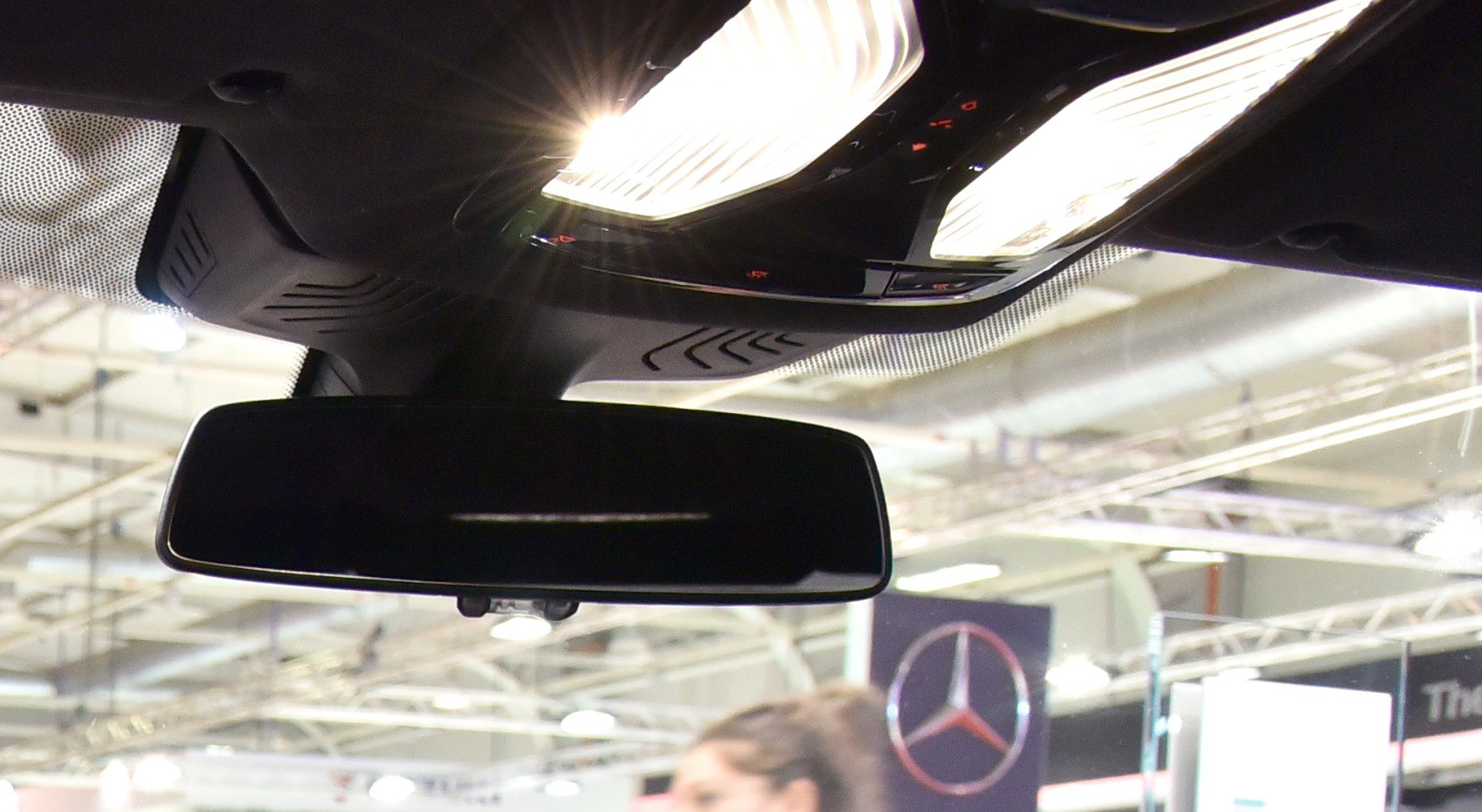 Interior rearview mirror and overhead console lighting close-up