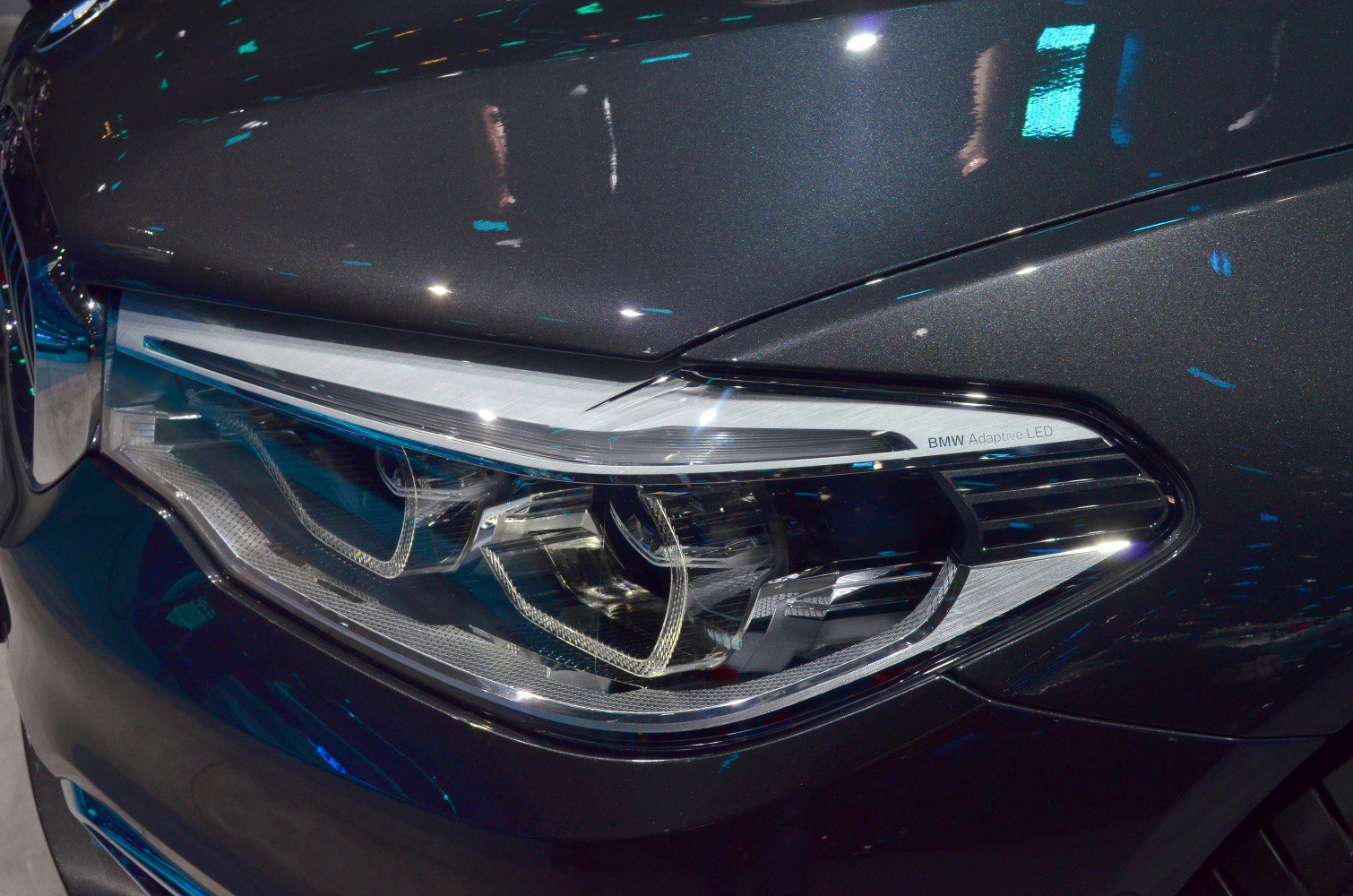 BMW adaptive LED headlight close-up with intricate design