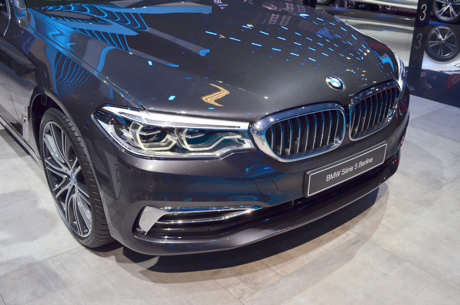 Front grille and LED headlights of a luxury sedan