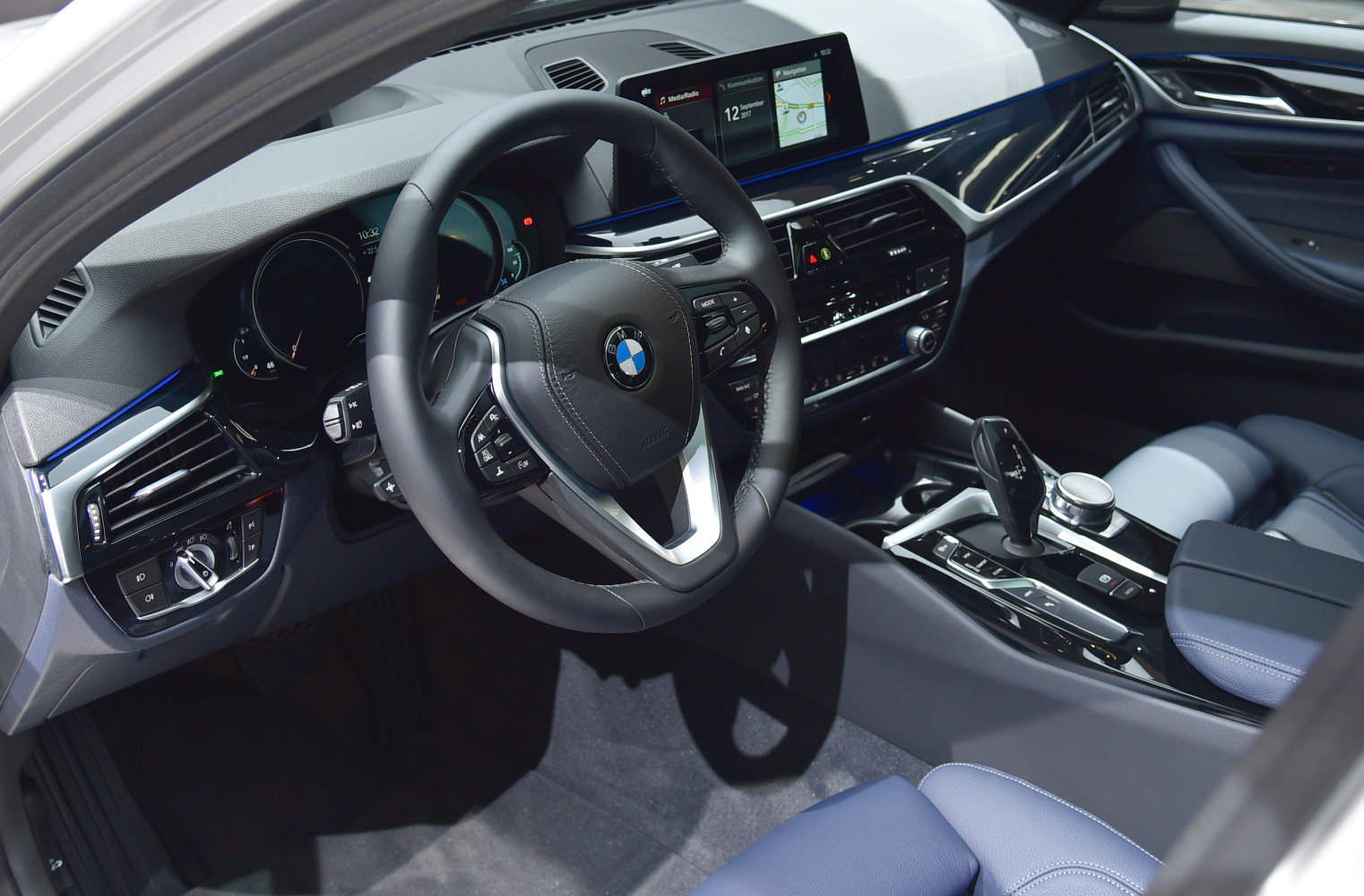 Modern dashboard and multifunctional steering wheel with digital display