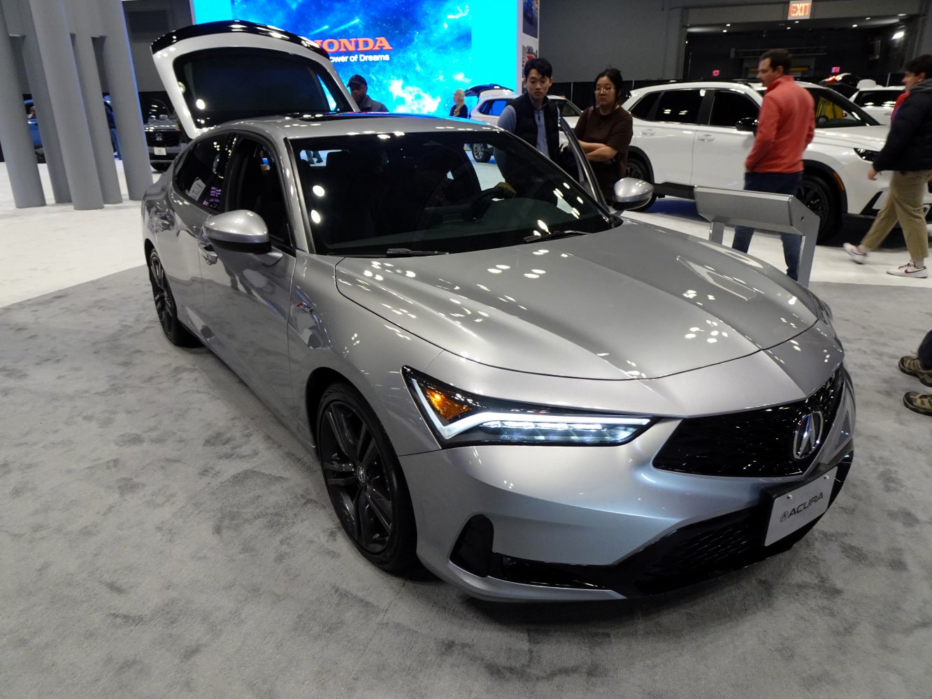 Front view with LED headlights and sporty black grille.