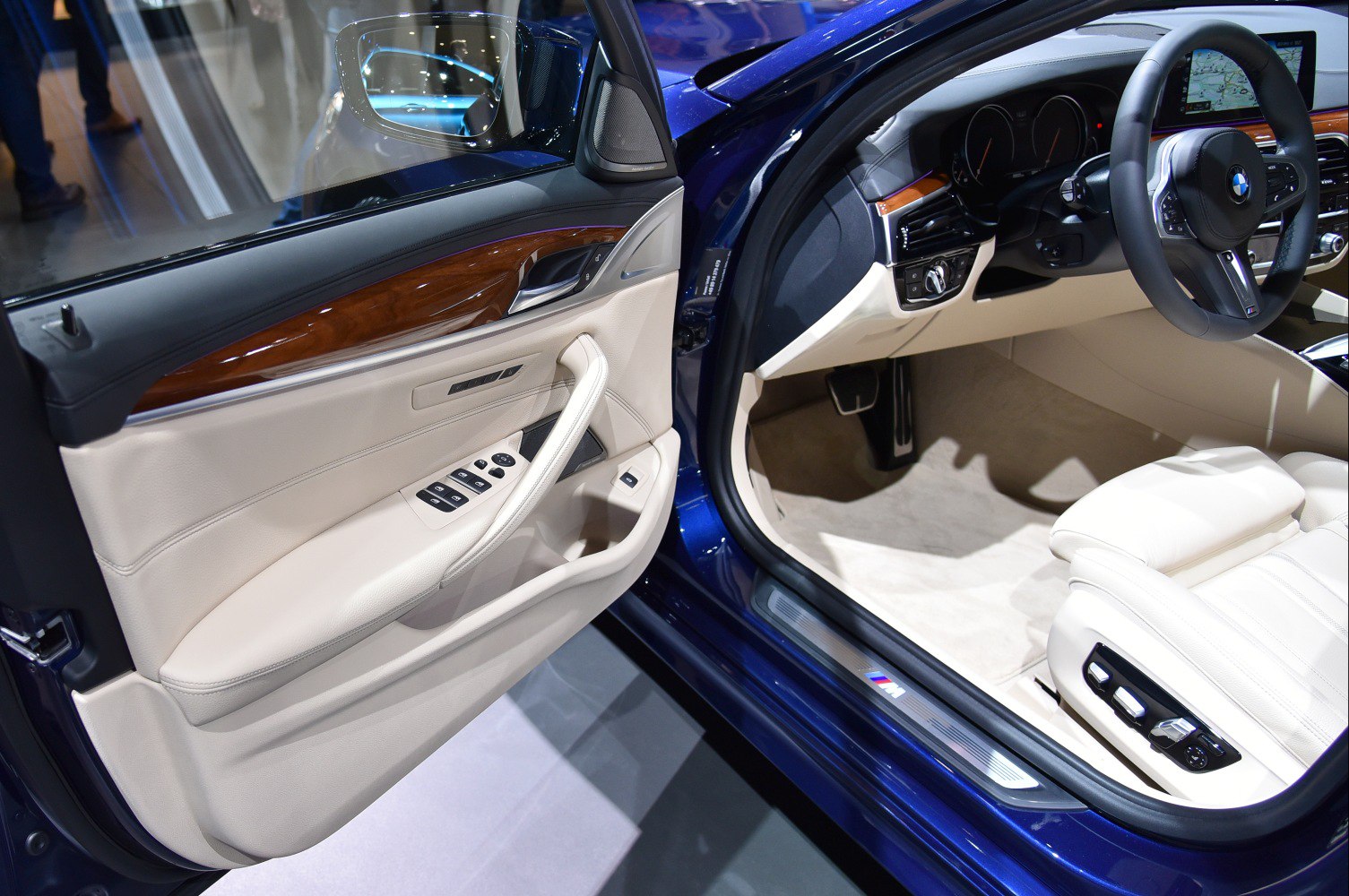 Luxury beige interior door panel and electric driver seat controls