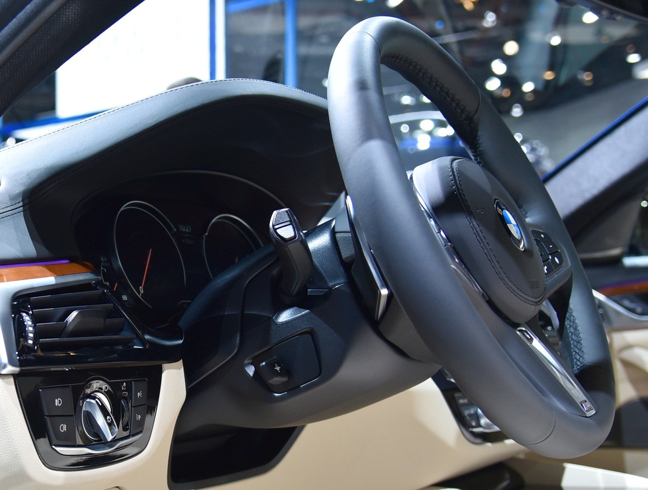 Close-up of steering wheel with dashboard and control panel