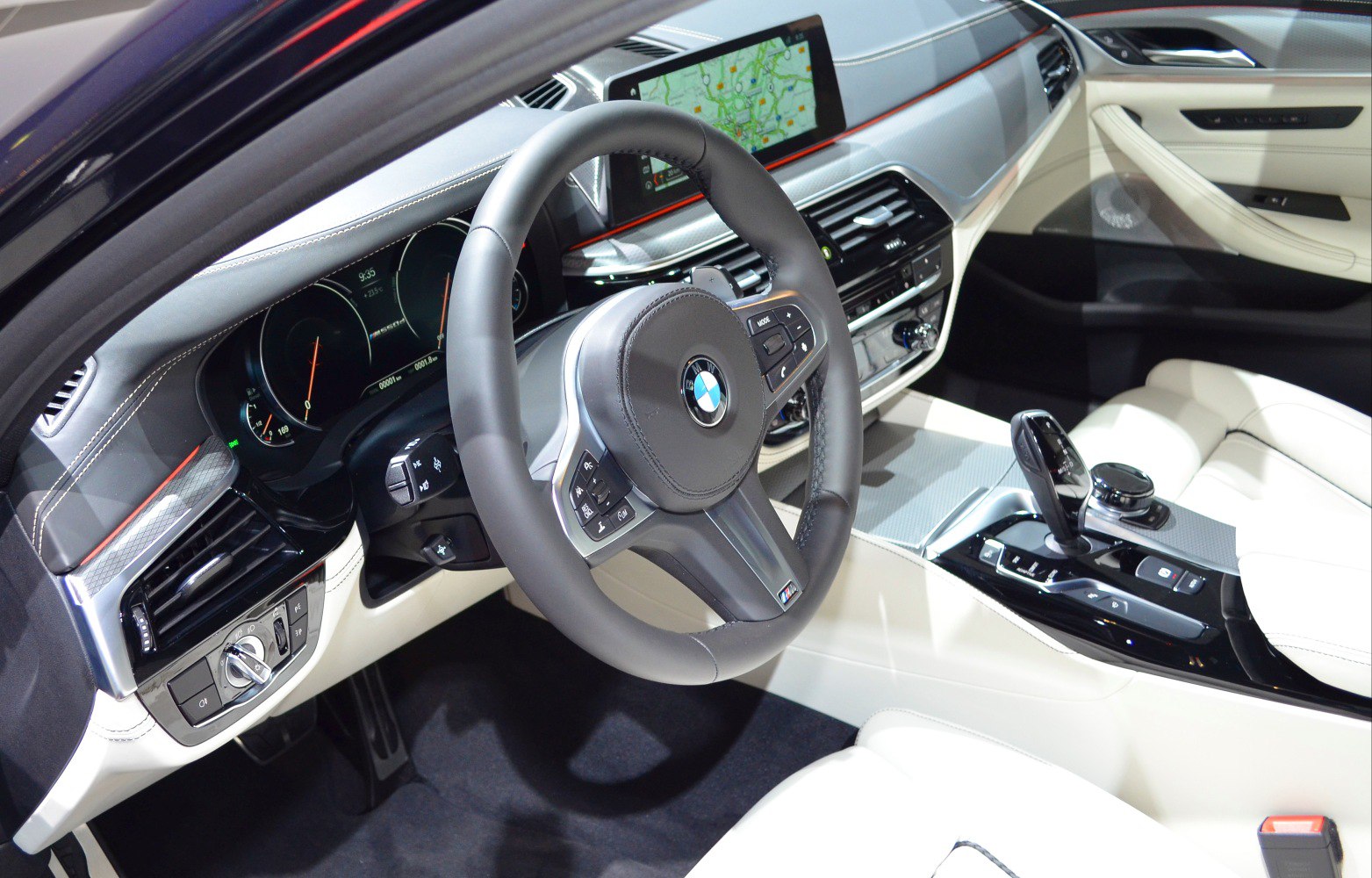 Modern digital dashboard and multifunction steering wheel in luxury car interior