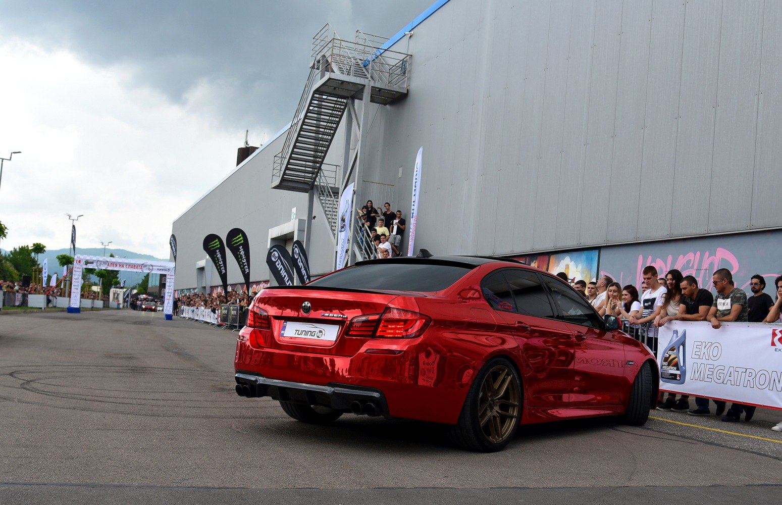 Red 5 Series Sedan F10 rear with tinted windows and bronze wheels