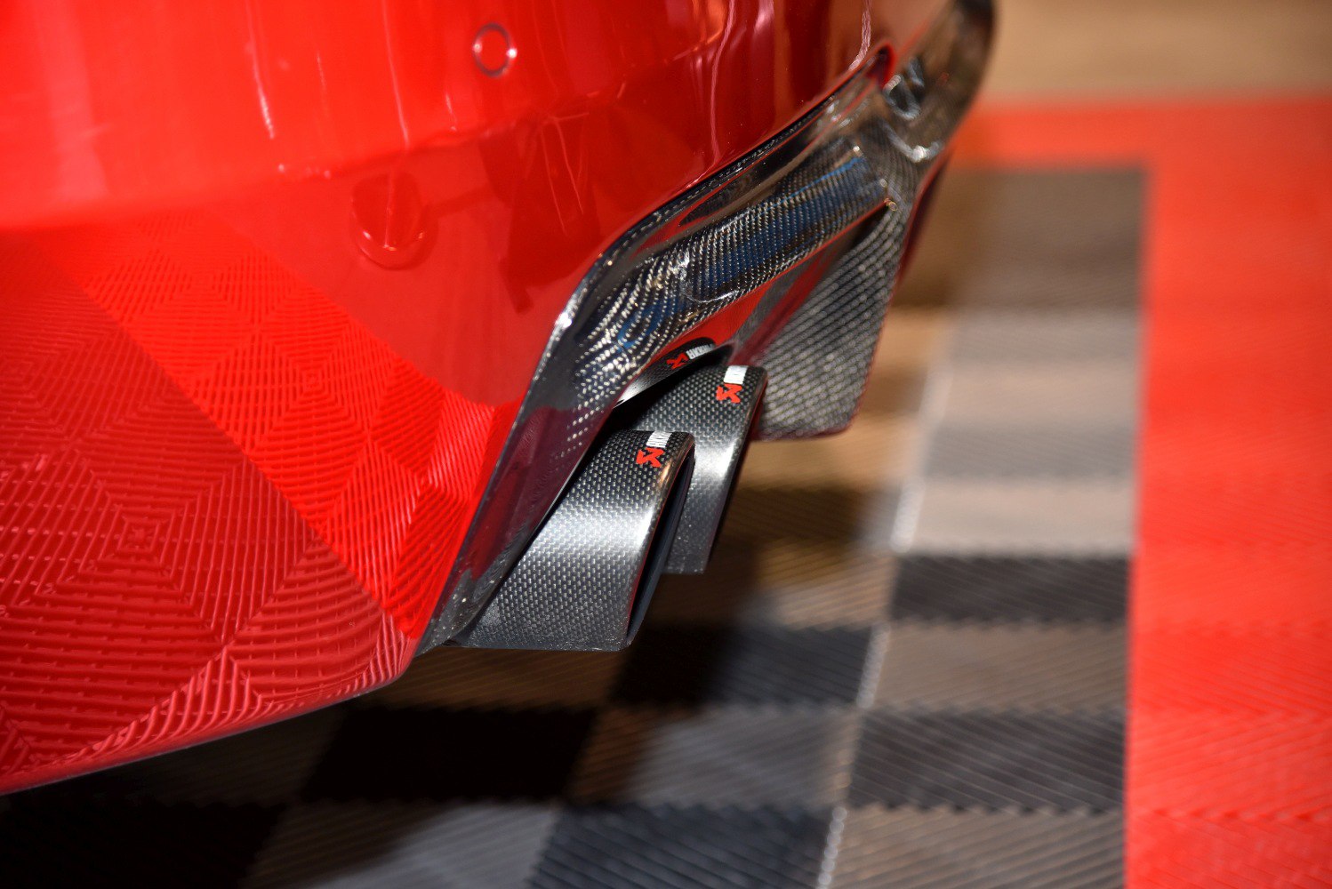 Carbon fiber dual exhaust tips and rear diffuser
