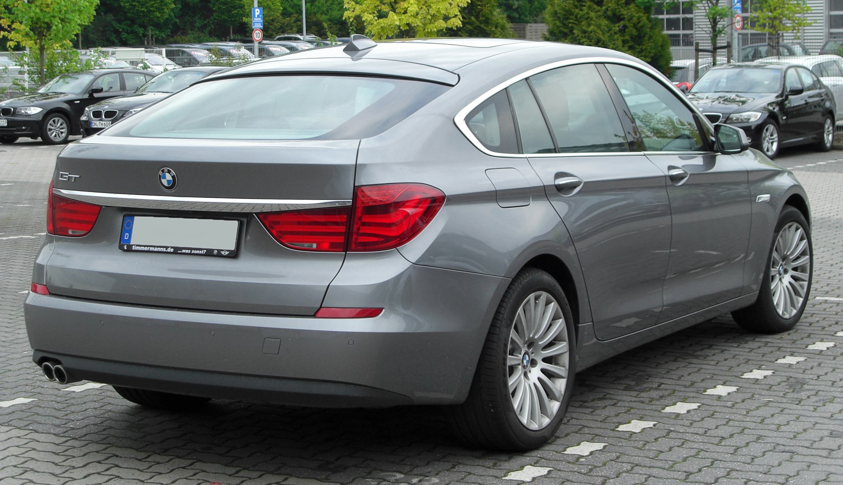 Rear side view hatchback with distinctive curves and alloy wheels